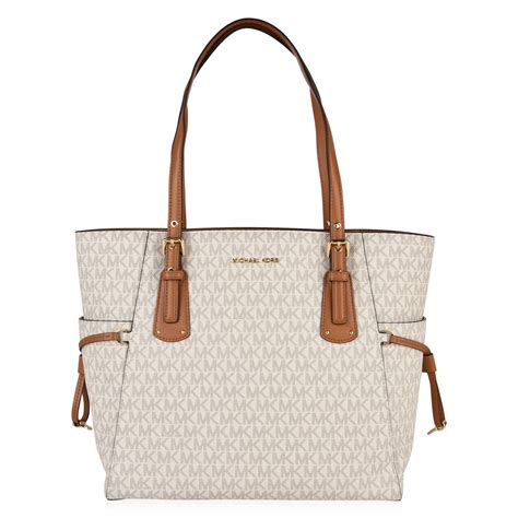 michael kors grained leather voyager tote bag|Michael Kors voyager tote sale.